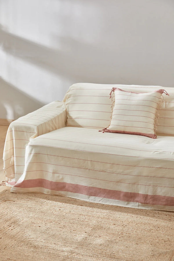 Sofa cover with red knitted stripes Tiana
