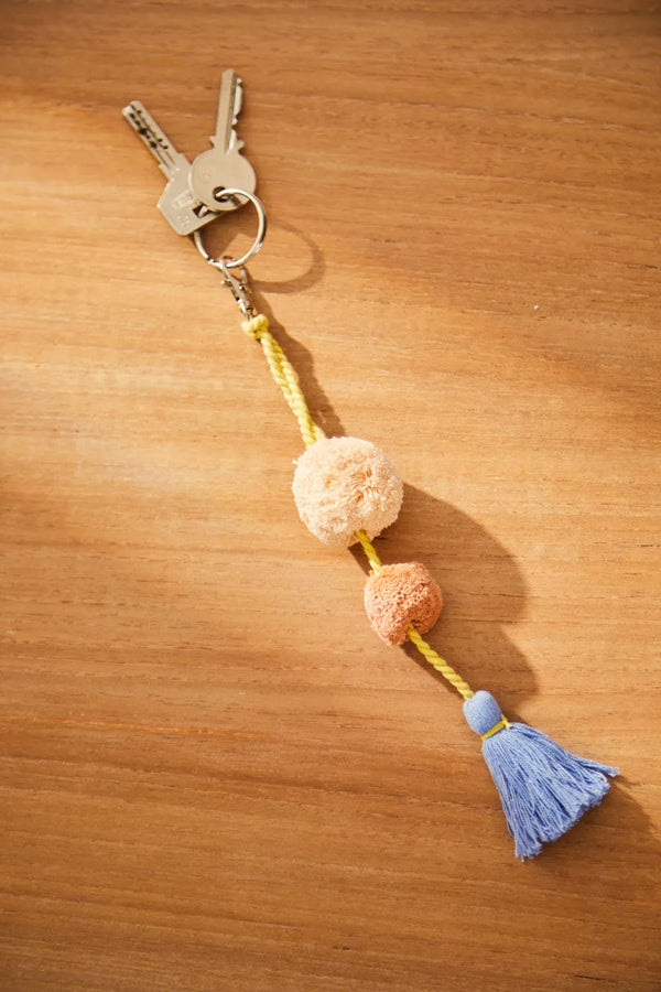 Blue pompom keychain Canicas