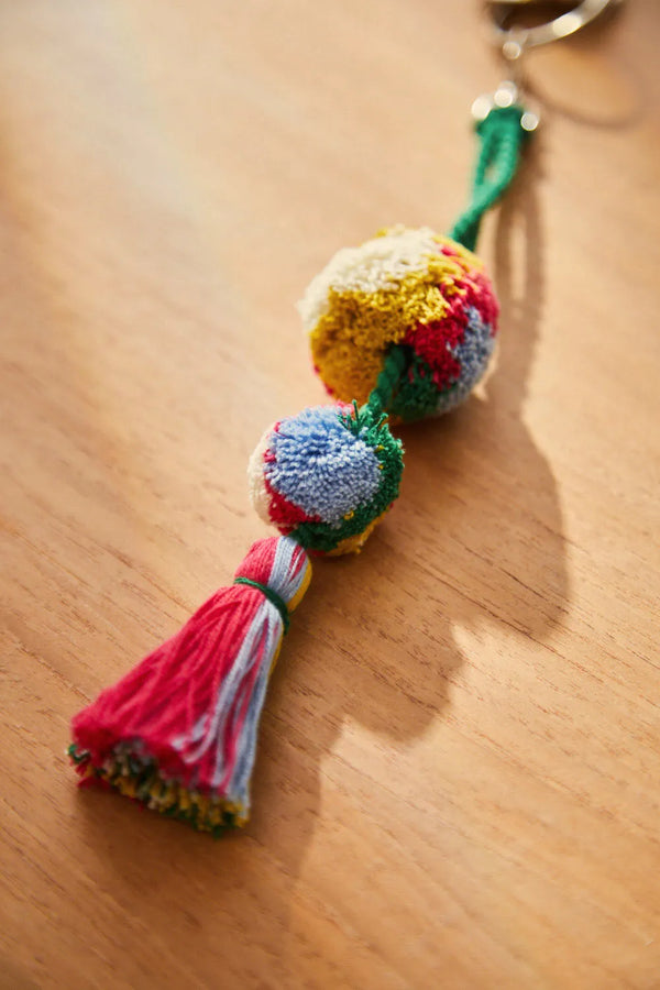 Fuchsia Canicas pompom keychain