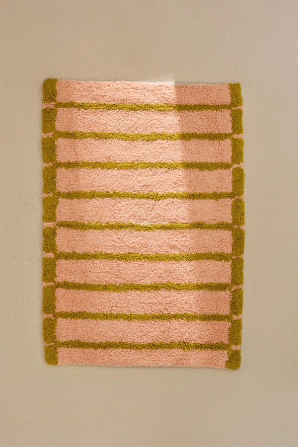 Alfombra de baño a rayas rosas Saturno