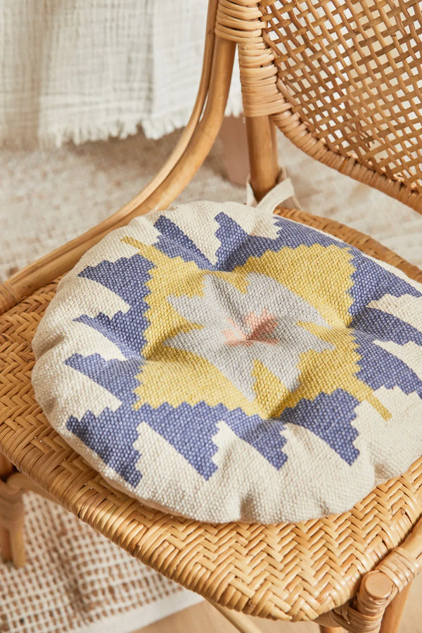 Washable round cotton dhourrie chair cushion with boho print Berta