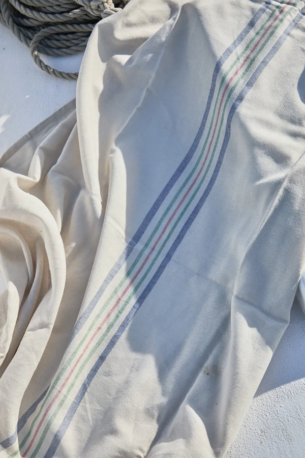 Beige Pineda woven stripe beach towel