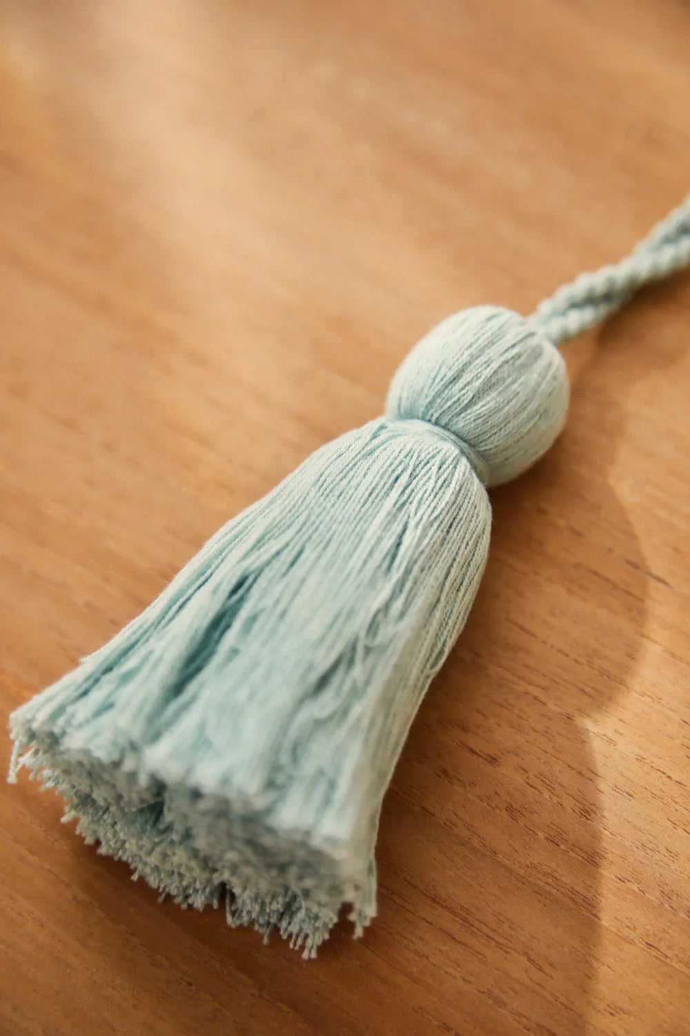 Pompón turquesa Horn-Calma House