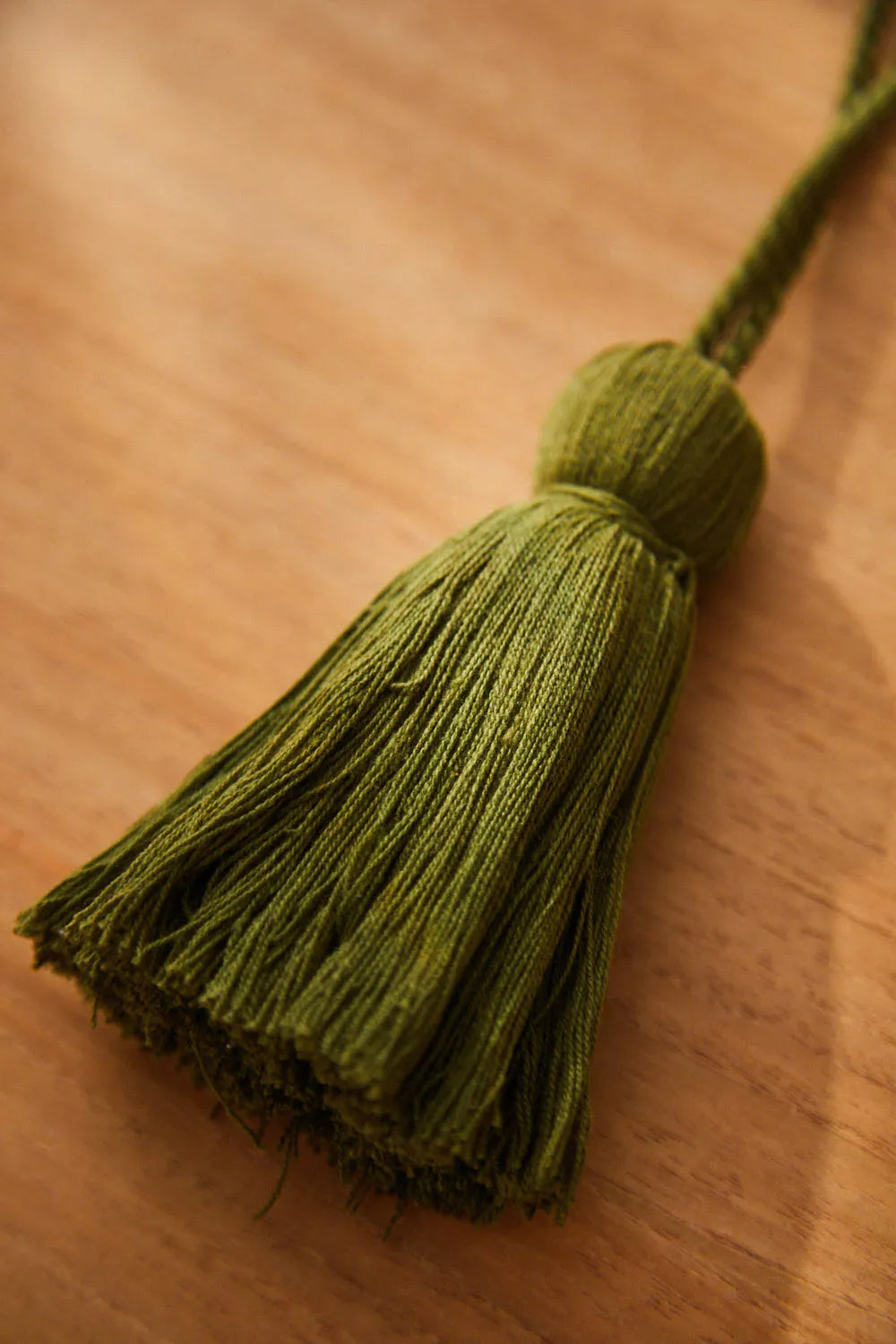 Pompón verde oscuro Horn-Calma House