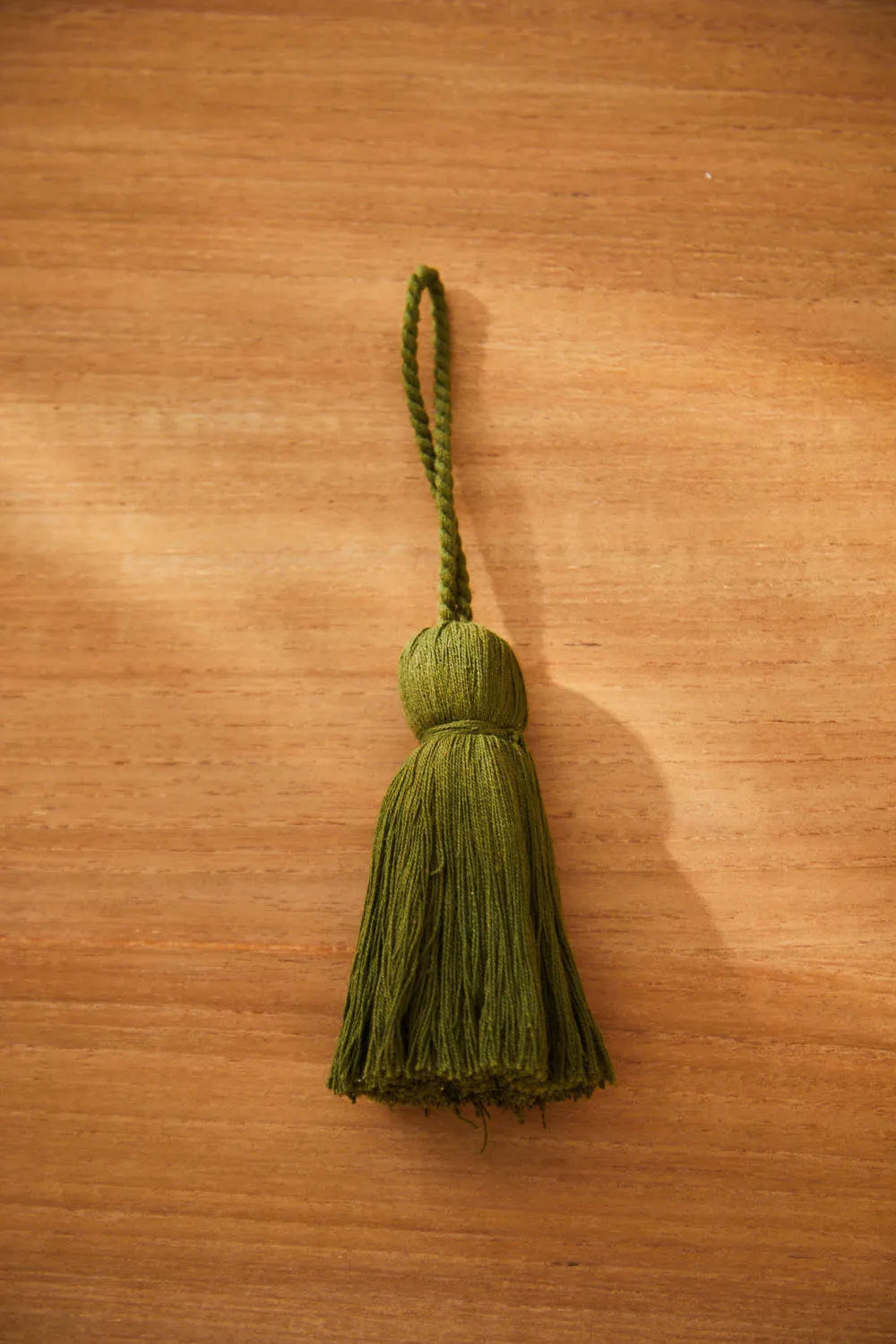 Pompón verde oscuro Horn-Calma House